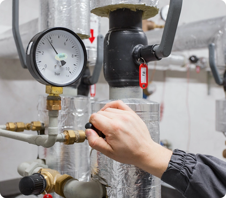 Plumber shutting off gas valve