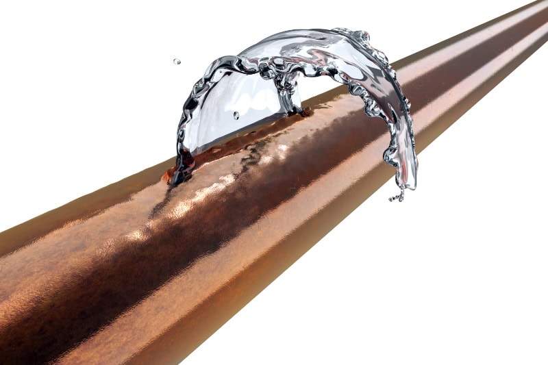 Copper pipe bursts and starts leaking water after being frozen.